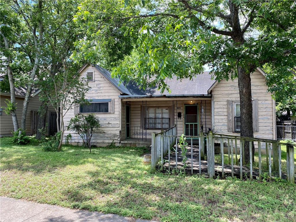 1107 Myrtle Street Austin, TX 78702 - Photo 1 of 1 a view of house with a yard