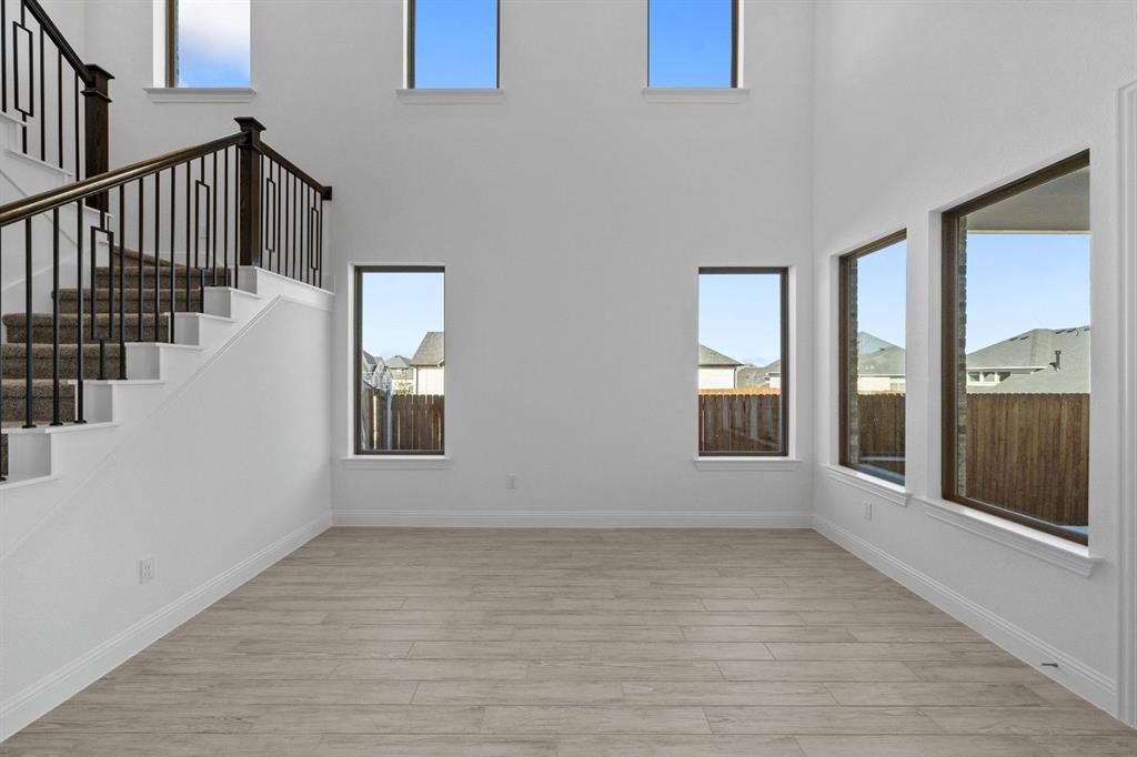 937 Mumms Drive Justin, TX 76247 - Photo 12 of 26 a view of an entryway with wooden floor and door