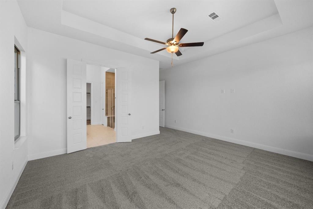 937 Mumms Drive Justin, TX 76247 - Photo 14 of 26 a view of empty room with ceiling fan