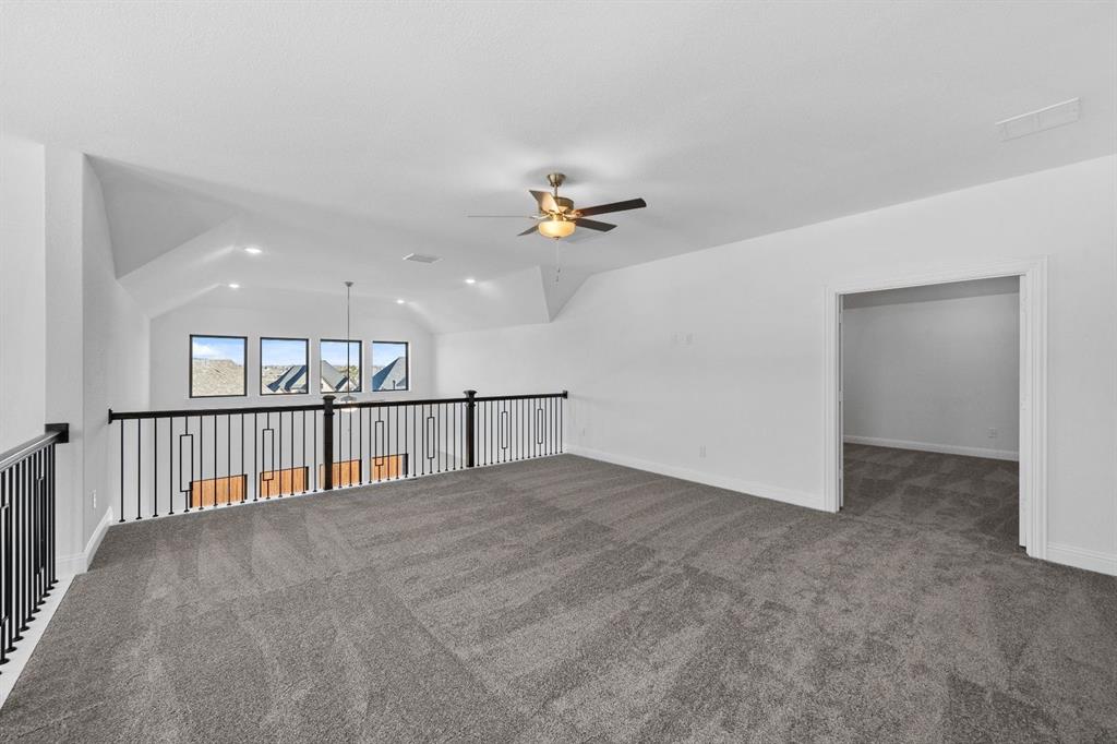 937 Mumms Drive Justin, TX 76247 - Photo 19 of 26 a view of a livingroom with a ceiling fan
