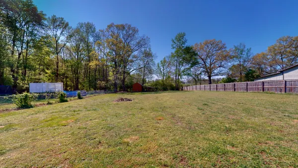 a fire hydrant in the middle of a field