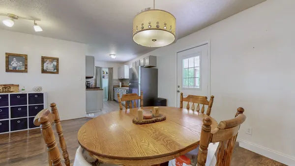 a view of a dining room with furniture