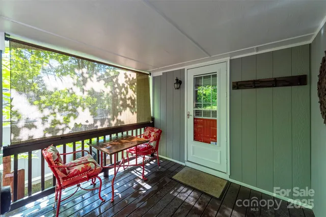 a view of a porch with furniture
