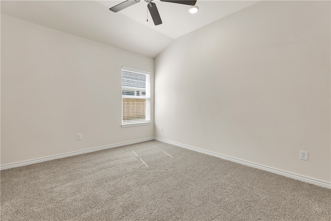 3520 Pointe Du Hoc Drive Bryan, TX 77808 - Photo 32 of 40 Secondary bedroom 1