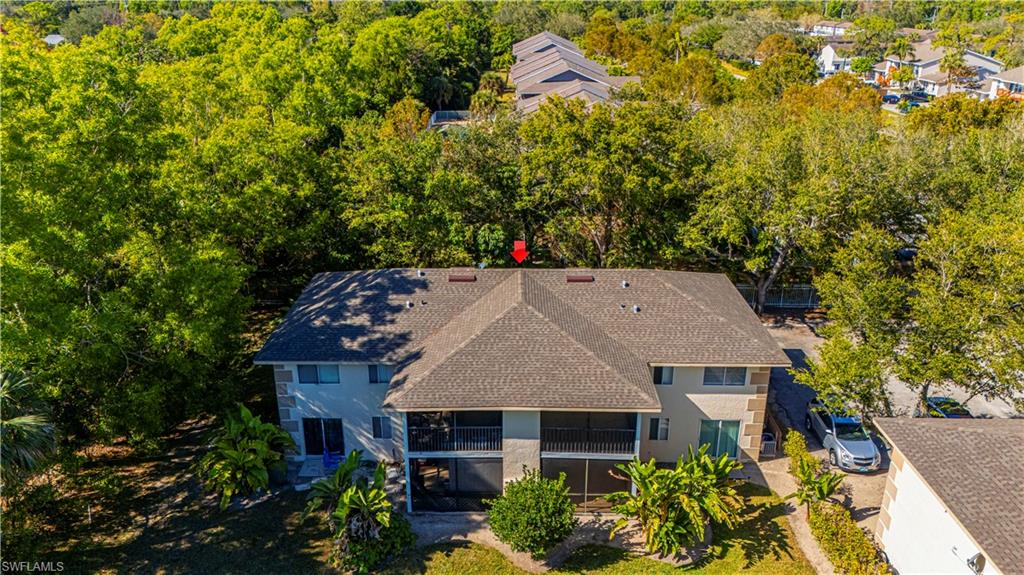 5434 16th Place Southwest, Unit D3 Golden Gate, FL 34116 - Photo 2 of 17 an aerial view of a house