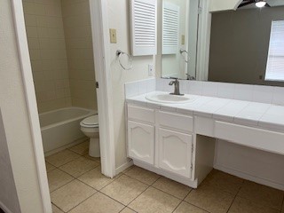 4419 Stallion Brook Lane Spring, TX 77388 - Photo 11 of 15 a bathroom with a sink a toilet and shower