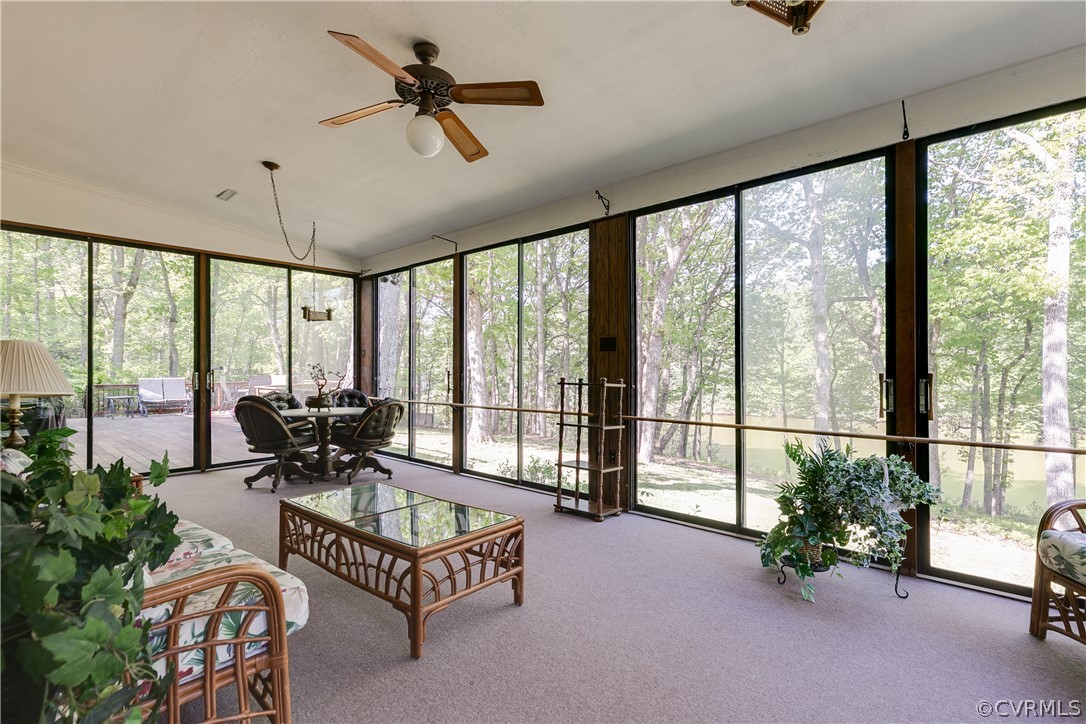 2780 East Brigstock Road Midlothian, VA 23113 - Photo 16 of 50 a living room with furniture and a large window