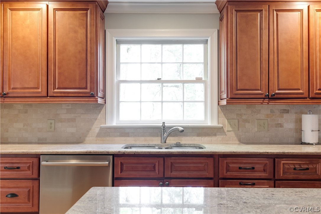 2780 East Brigstock Road Midlothian, VA 23113 - Photo 19 of 50 a kitchen with granite countertop cabinets sink and window