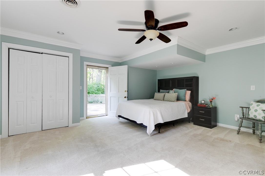 2780 East Brigstock Road Midlothian, VA 23113 - Photo 26 of 50 a bedroom with a bed and a chandelier