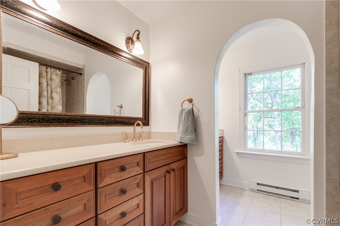 2780 East Brigstock Road Midlothian, VA 23113 - Photo 30 of 50 a bathroom with a granite countertop sink and a mirror
