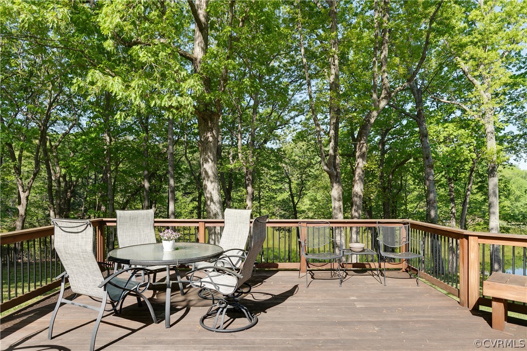 2780 East Brigstock Road Midlothian, VA 23113 - Photo 40 of 50 a view of a chairs and table in the deck