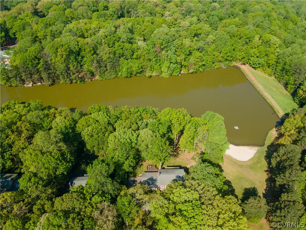2780 East Brigstock Road Midlothian, VA 23113 - Photo 46 of 50 a view of a lake with a yard