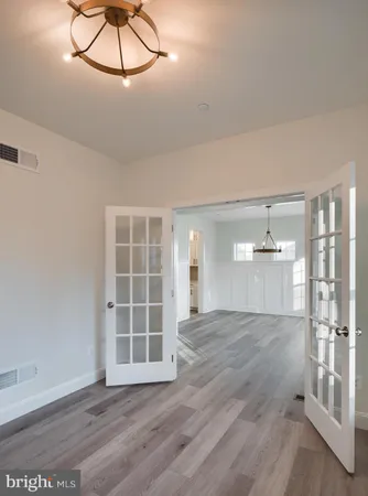 a view of entryway with wooden floor