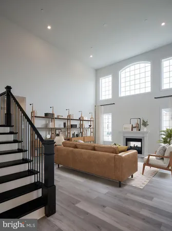 a dining room with a table and chairs