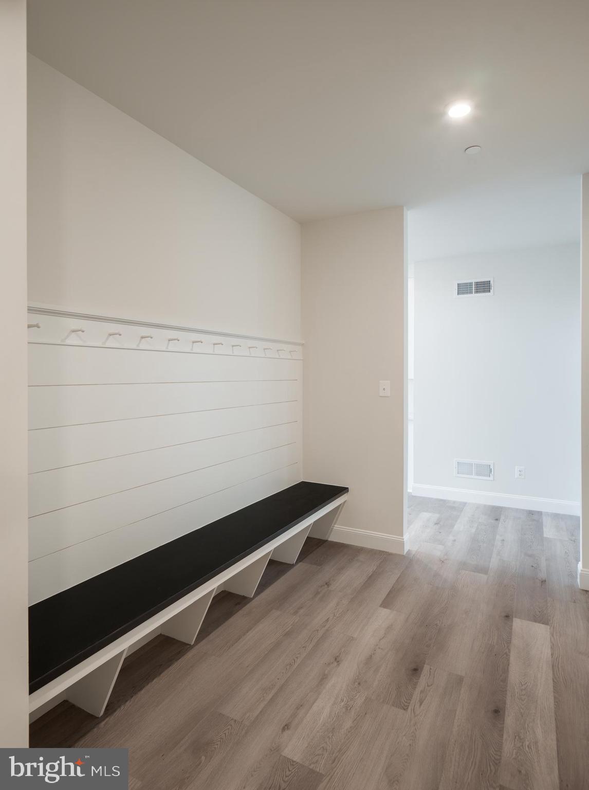 8528 Rocky Springs Road Frederick, MD 21702 - Photo 35 of 93 an empty room with wooden floor