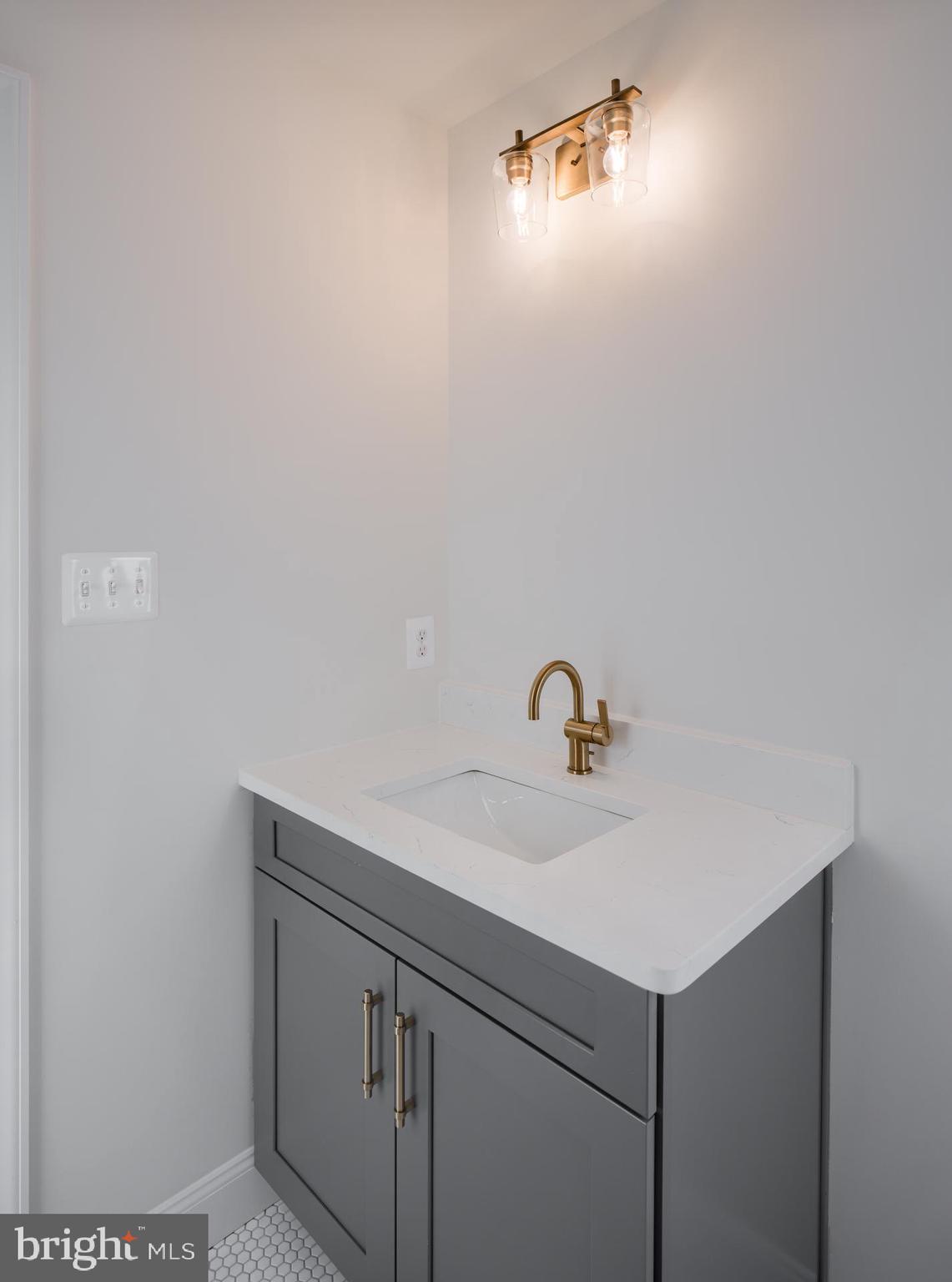 8528 Rocky Springs Road Frederick, MD 21702 - Photo 39 of 93 a bathroom with a sink and cabinets