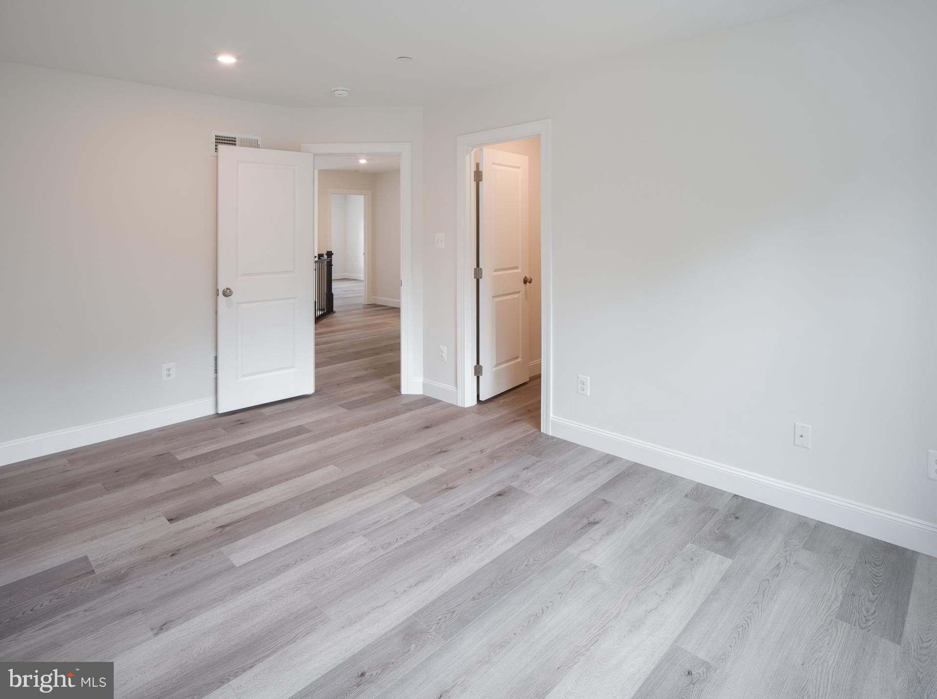 8528 Rocky Springs Road Frederick, MD 21702 - Photo 44 of 93 a view of empty room with wooden floor