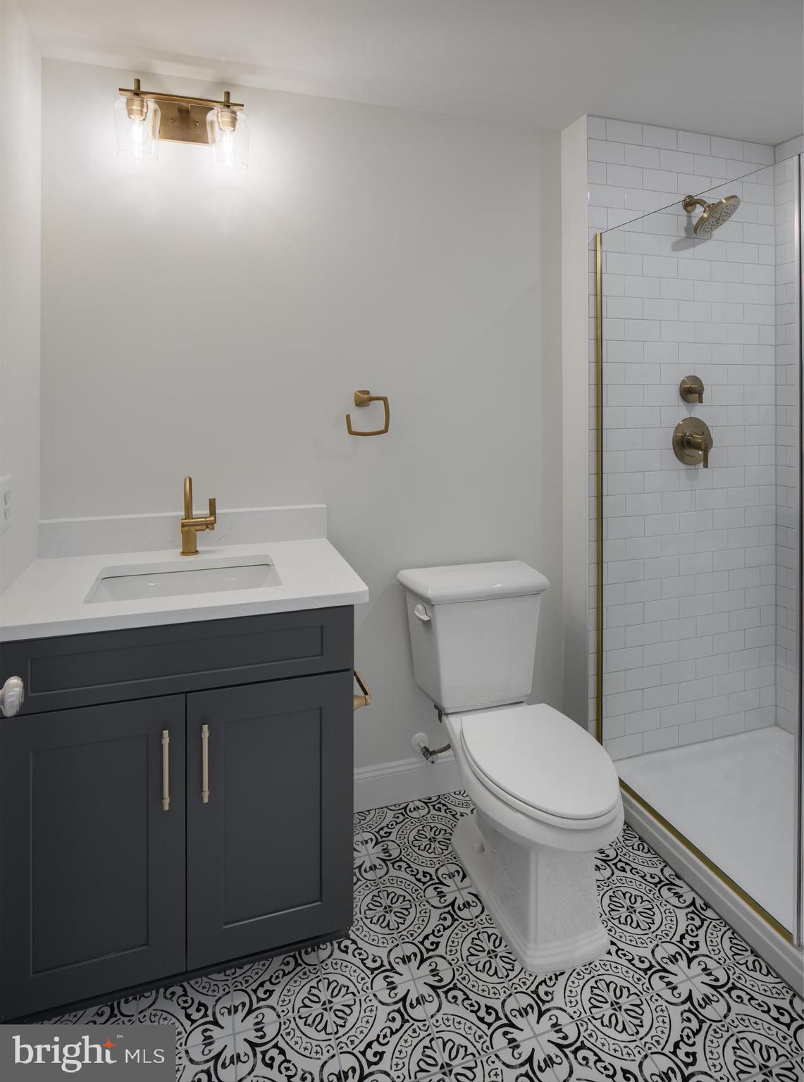8528 Rocky Springs Road Frederick, MD 21702 - Photo 46 of 93 a bathroom with a sink a toilet and shower