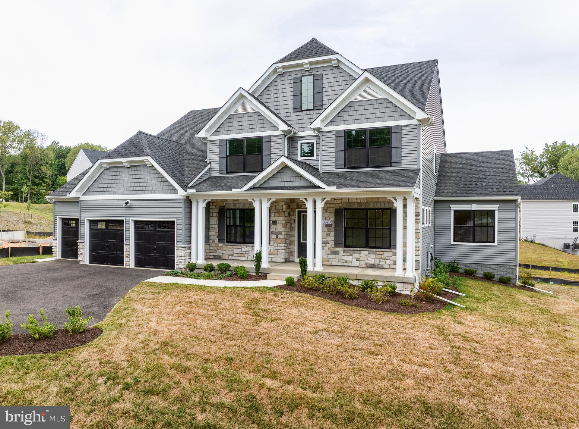 8528 Rocky Springs Road Frederick, MD 21702 - Photo 53 of 93 a front view of a house with garden