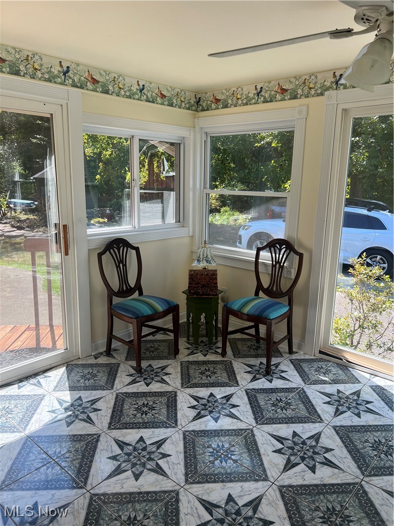 6171 Barrett Road Geneva, OH 44041 - Photo 13 of 38 Sunroom / solarium with baseboards