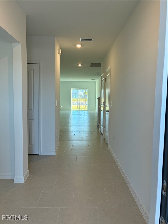 19726 Lavender Field Lehigh Acres, FL 33936 - Photo 3 of 7 a view of hallway with livingroom