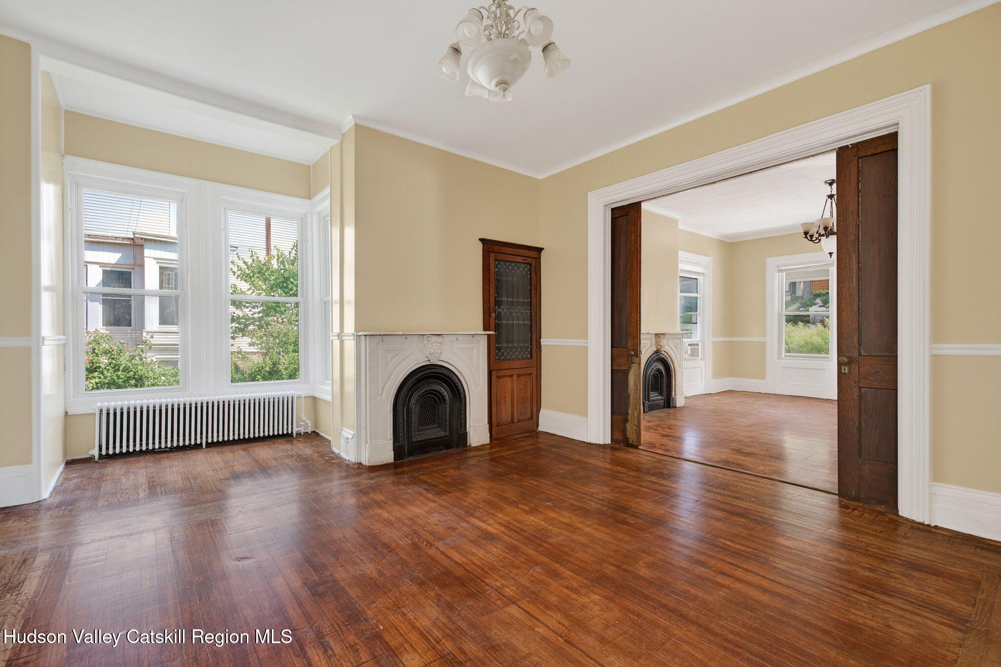 17 New Street Catskill, NY 12414 - Photo 14 of 92 a view of empty room with wooden floor and fan