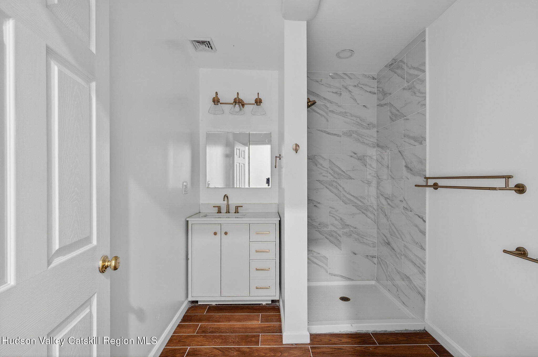 17 New Street Catskill, NY 12414 - Photo 50 of 92 a bathroom with a bathtub and shower