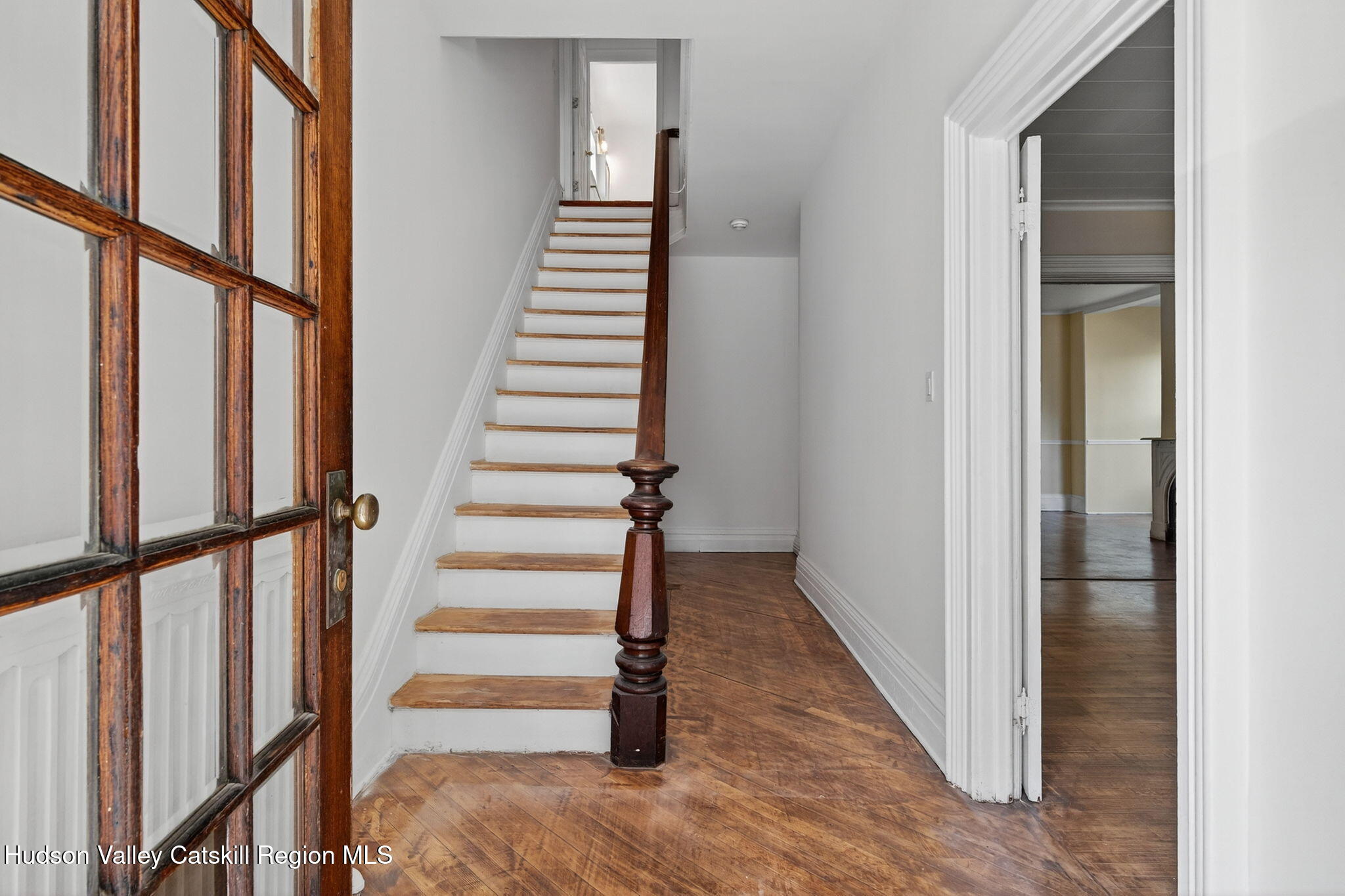 17 New Street Catskill, NY 12414 - Photo 5 of 92 a view of entryway with wooden floor and stairs
