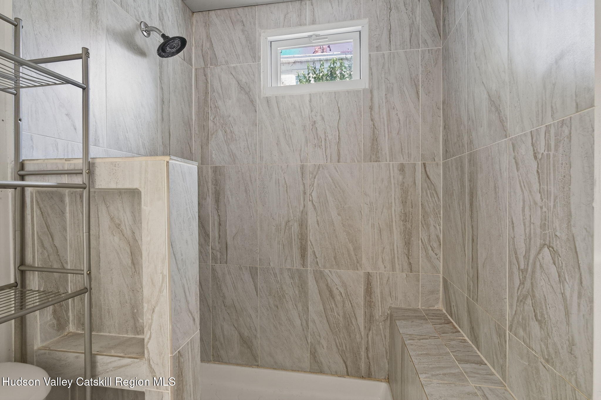 17 New Street Catskill, NY 12414 - Photo 61 of 92 a bathroom with a shower and a sink