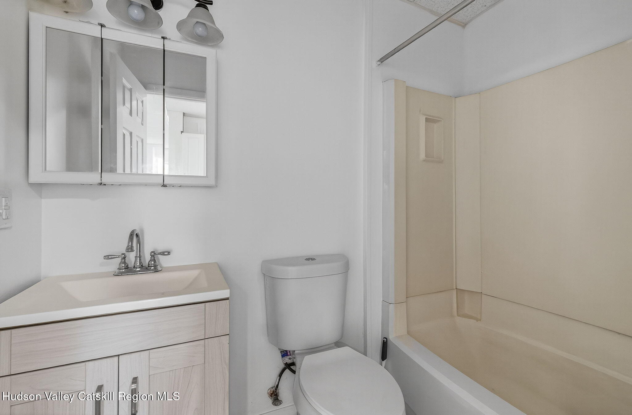 17 New Street Catskill, NY 12414 - Photo 81 of 92 a bathroom with a sink a toilet and shower