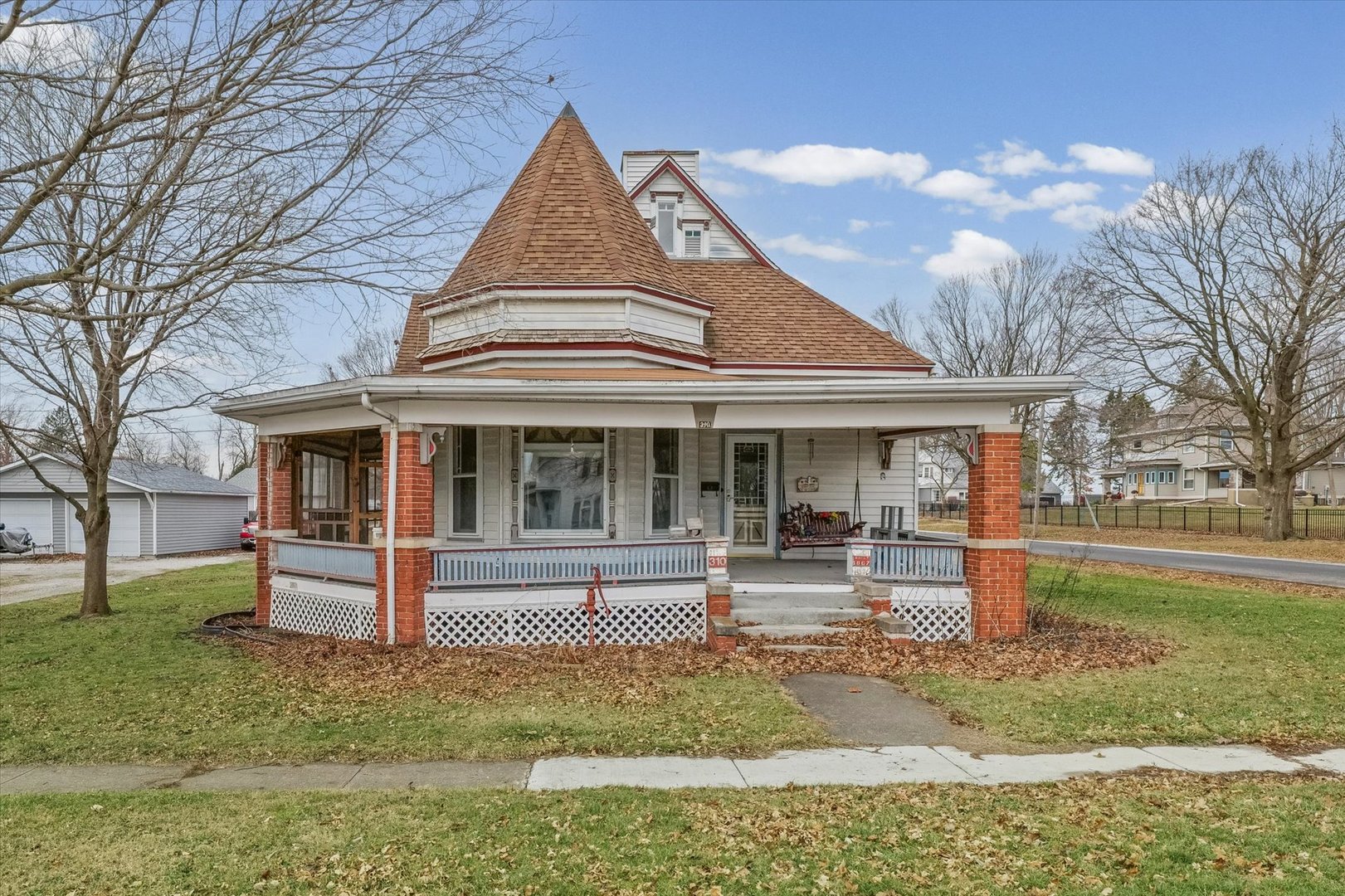 310 North Main Street Homer, IL 61849 - Photo 2 of 25 a front view of a house with a yard