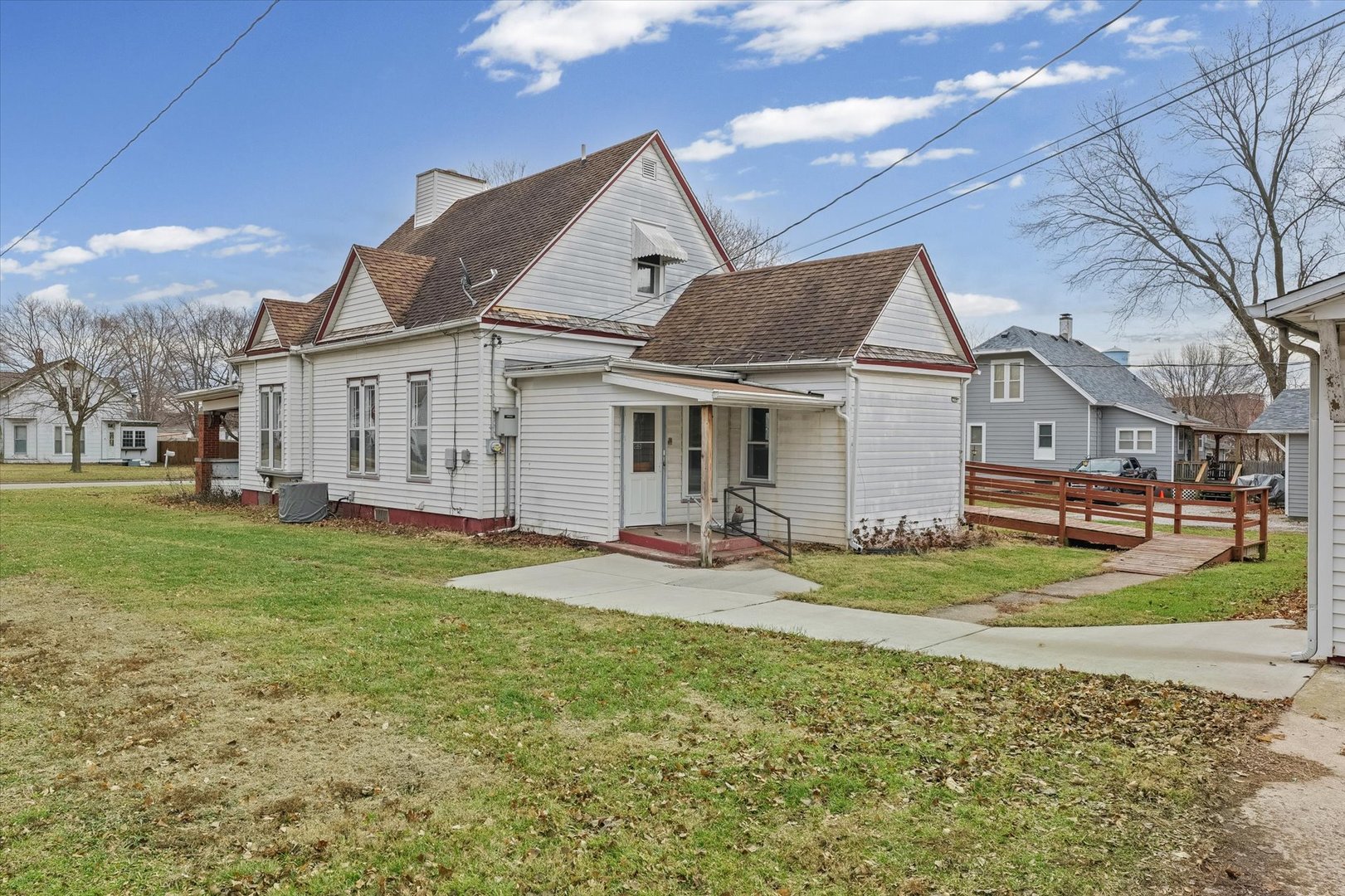310 North Main Street Homer, IL 61849 - Photo 23 of 25 a view of a big house with a big yard and large tree