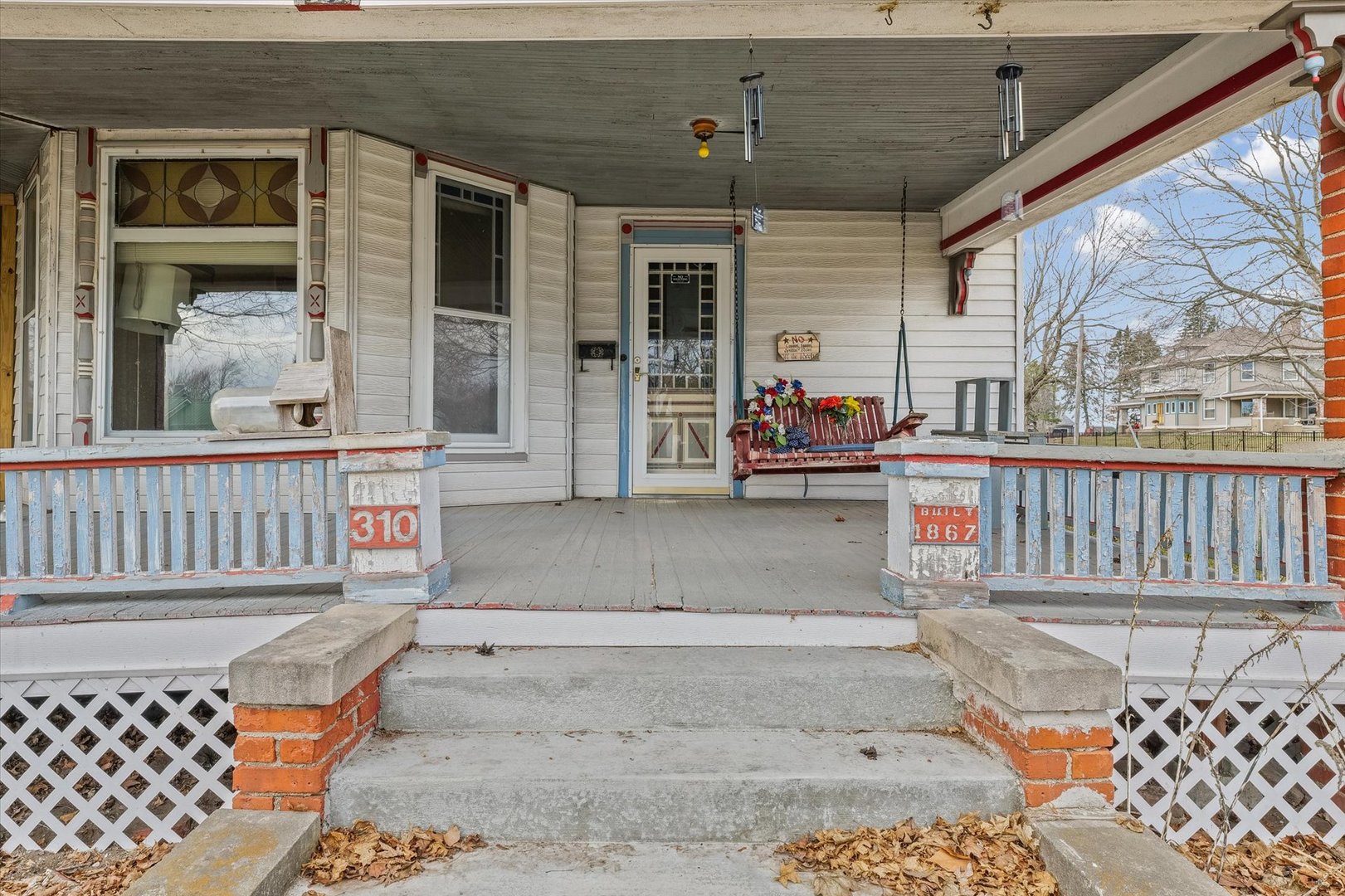 310 North Main Street Homer, IL 61849 - Photo 4 of 25 a view of a house with wooden fence