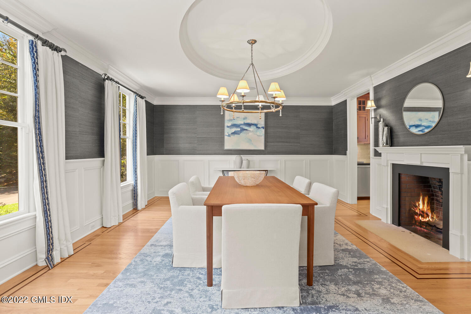 434 Cognewaugh Road Cos Cob, CT 06807 - Photo 16 of 47 a living room with furniture and a fireplace with wooden floor