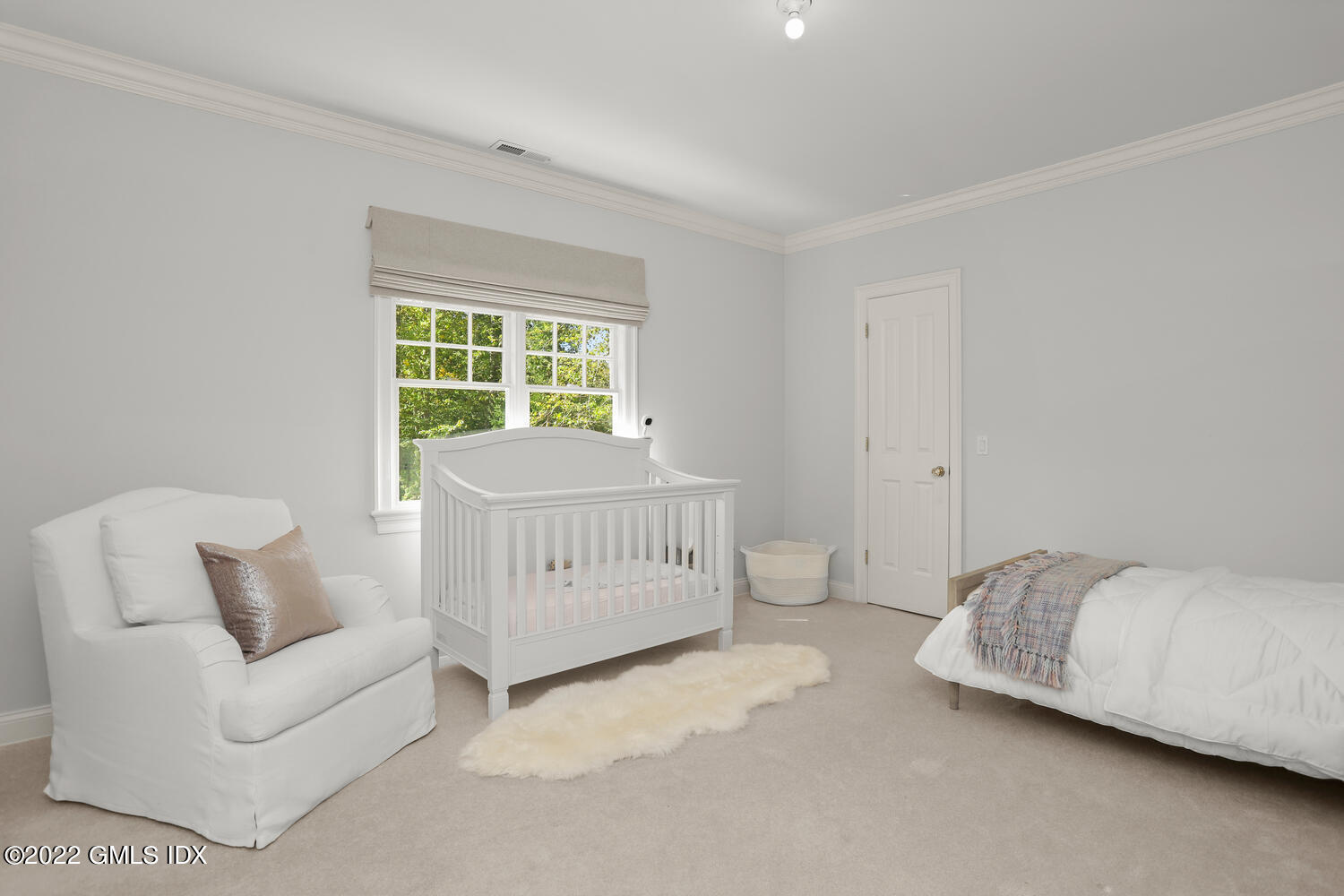 434 Cognewaugh Road Cos Cob, CT 06807 - Photo 20 of 47 a bedroom with a bed and a couch