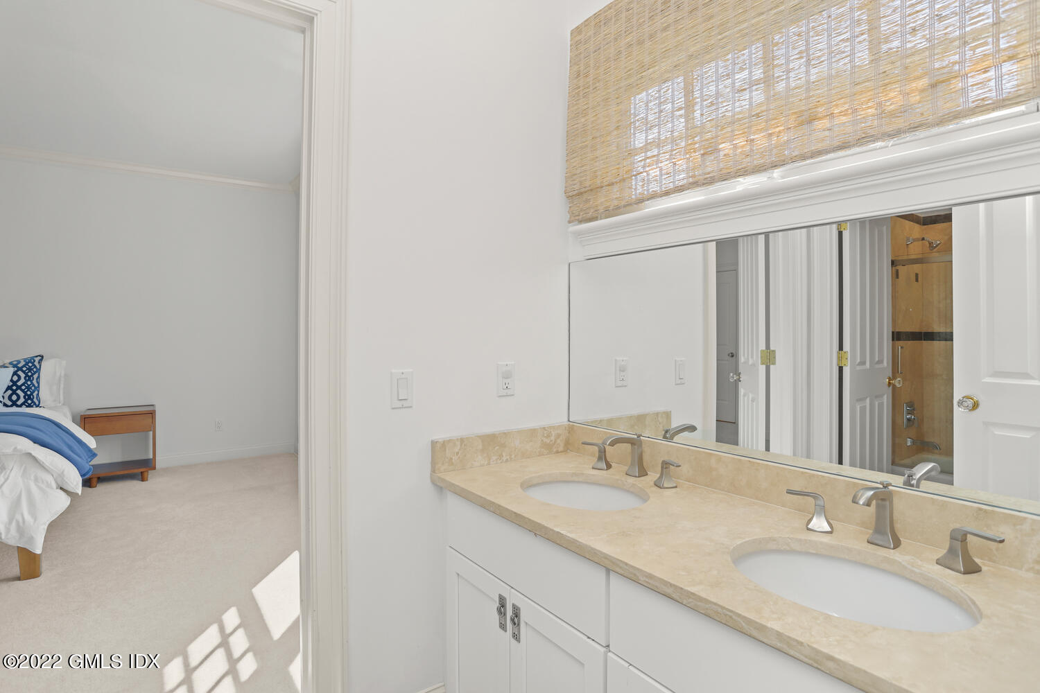 434 Cognewaugh Road Cos Cob, CT 06807 - Photo 21 of 47 a bathroom with a granite countertop sink and a mirror