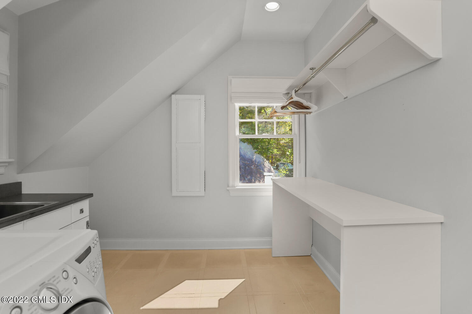 434 Cognewaugh Road Cos Cob, CT 06807 - Photo 26 of 47 a view of storage and utility room with a window