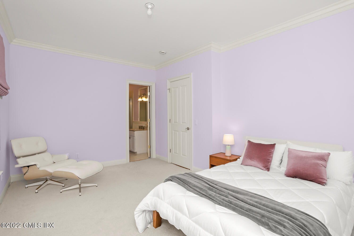 434 Cognewaugh Road Cos Cob, CT 06807 - Photo 27 of 47 a bedroom with a bed and a table