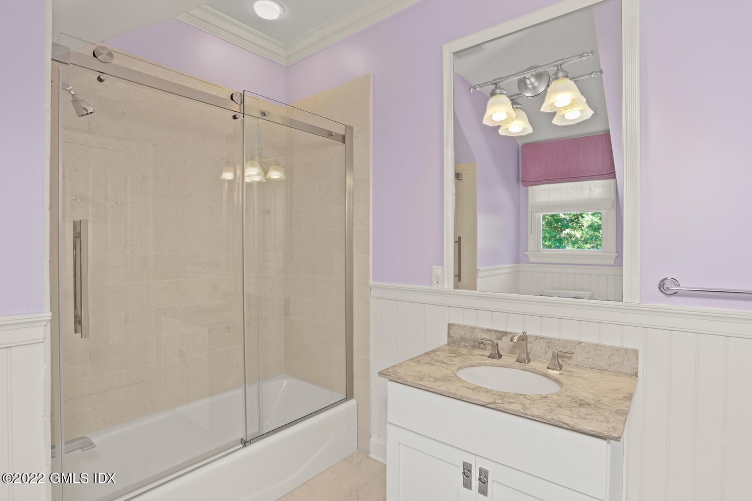 434 Cognewaugh Road Cos Cob, CT 06807 - Photo 28 of 47 a bathroom with a sink a vanity a mirror and a shower