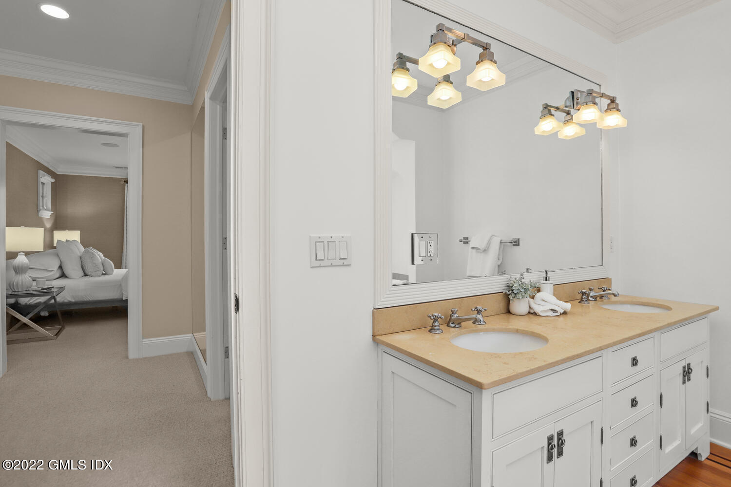 434 Cognewaugh Road Cos Cob, CT 06807 - Photo 32 of 47 a bathroom with a sink vanity and a mirror