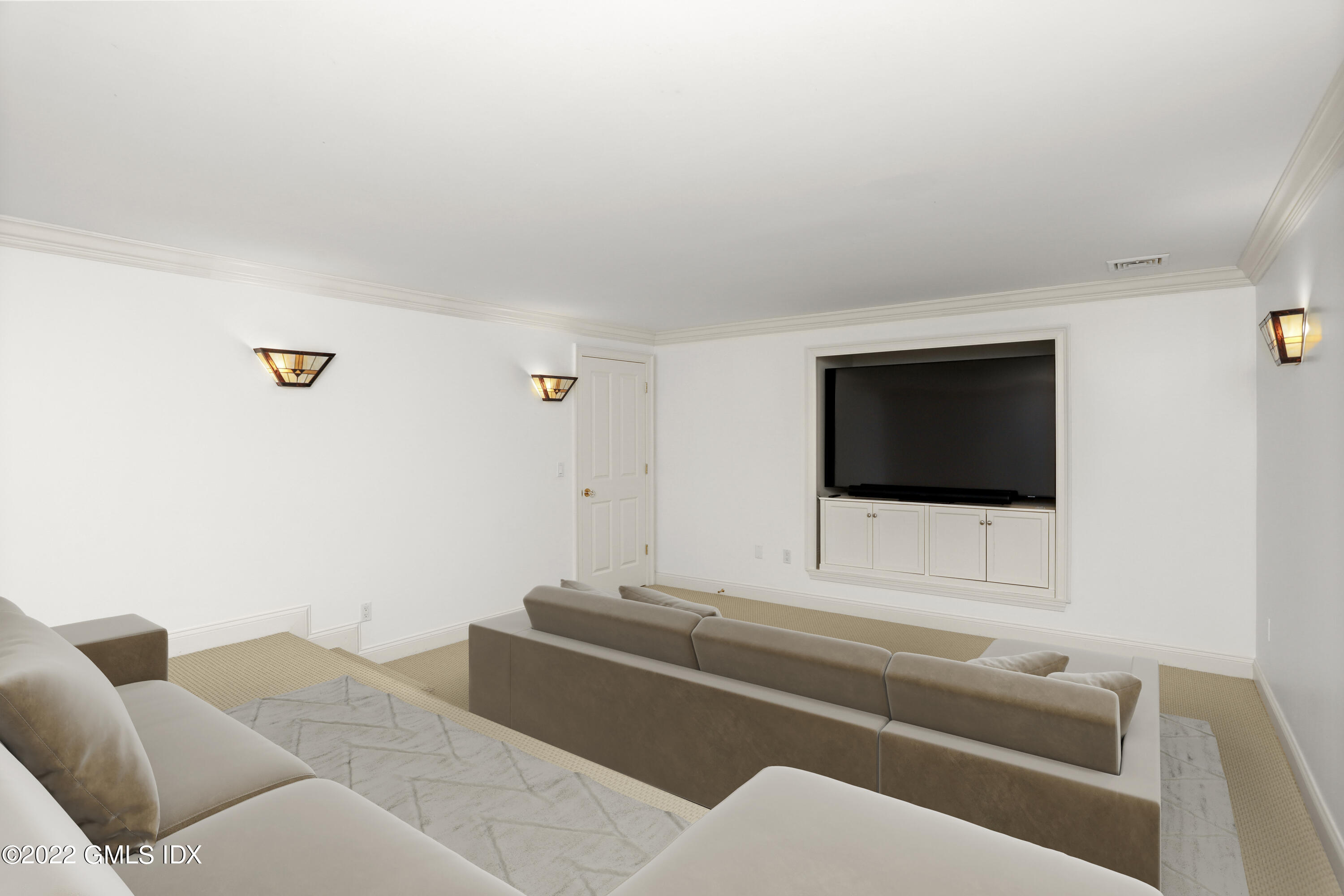 434 Cognewaugh Road Cos Cob, CT 06807 - Photo 38 of 47 a living room with furniture and a flat screen tv