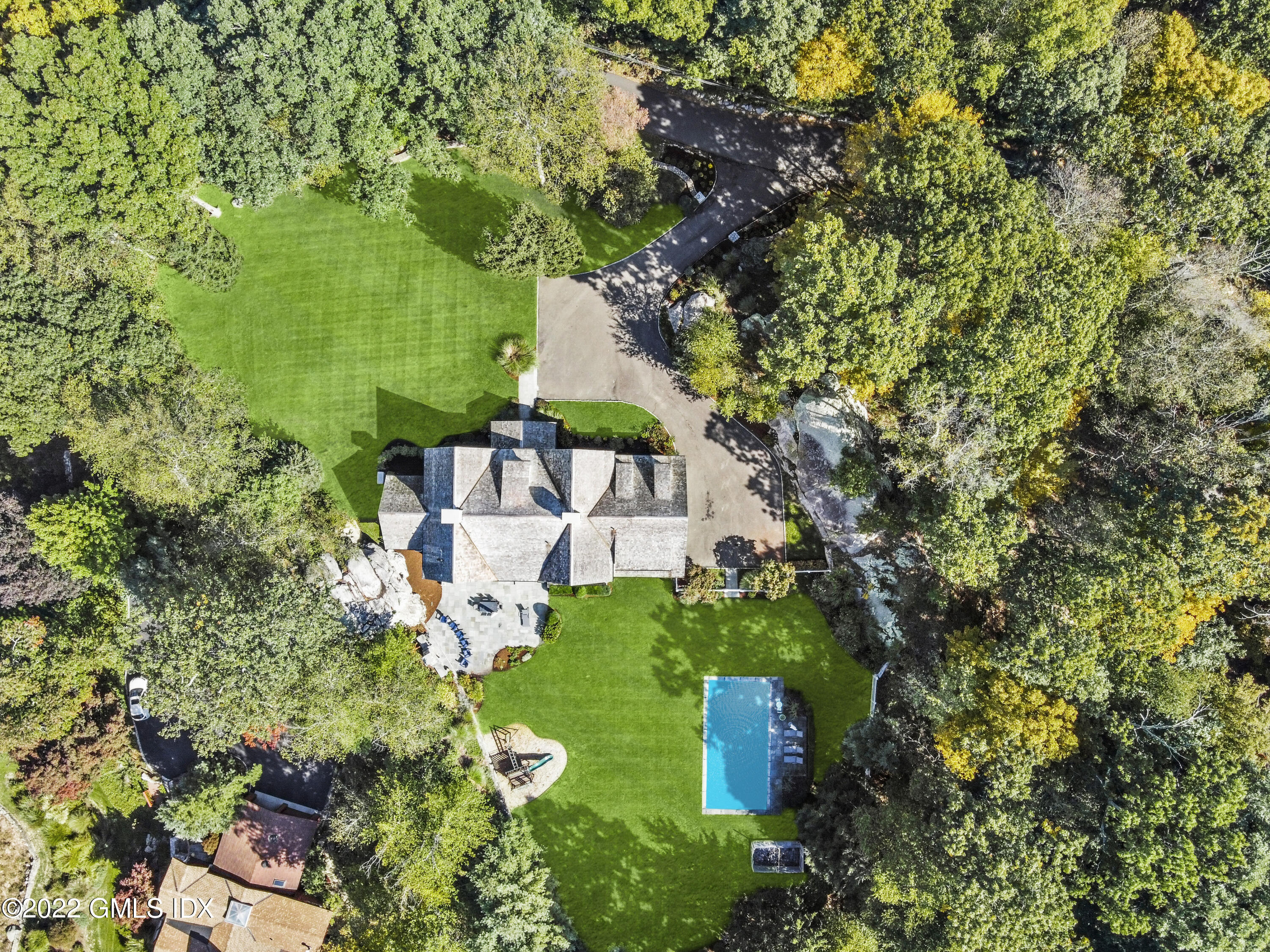 434 Cognewaugh Road Cos Cob, CT 06807 - Photo 43 of 47 an aerial view of a house with a yard