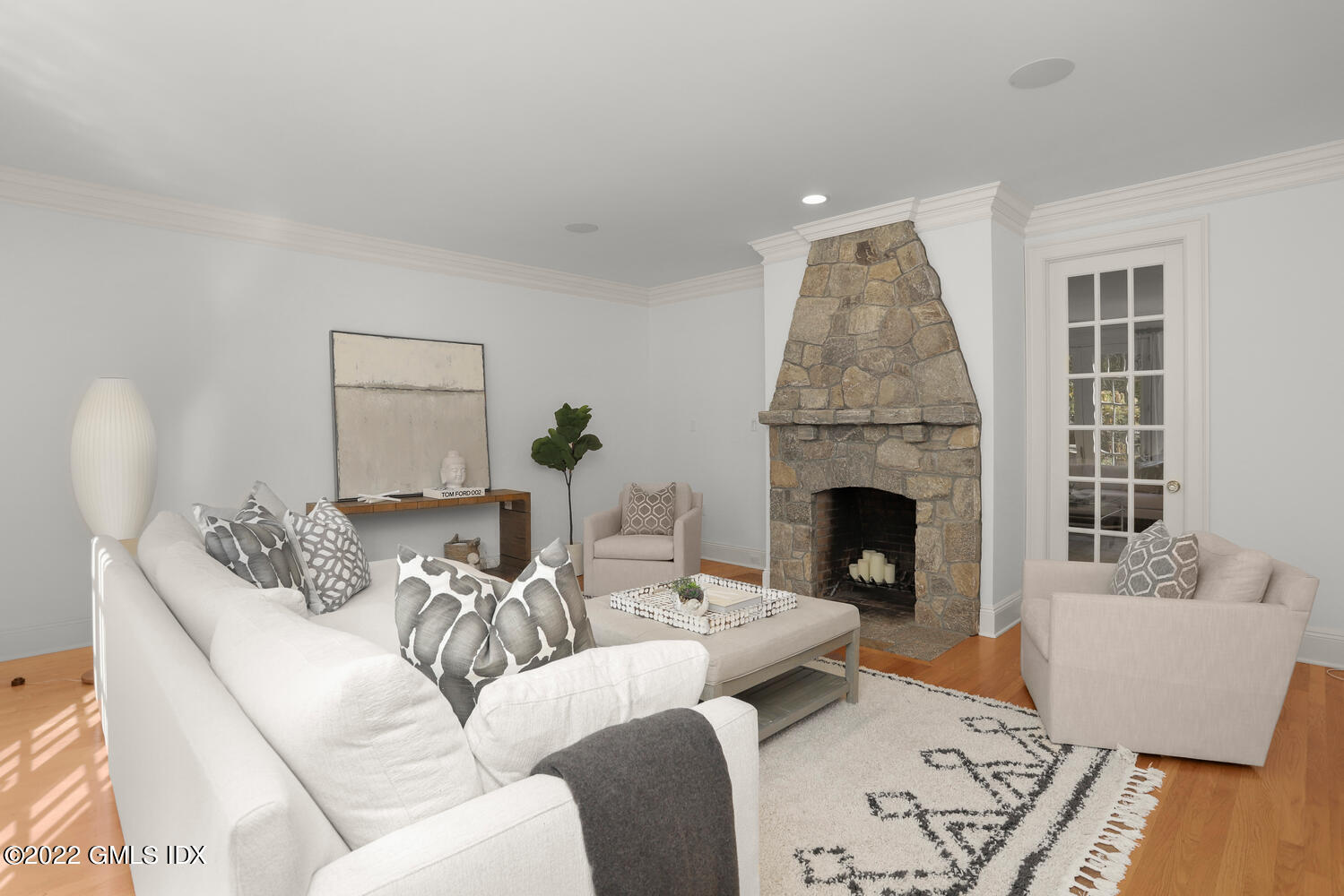 434 Cognewaugh Road Cos Cob, CT 06807 - Photo 8 of 47 a living room with furniture and a fireplace