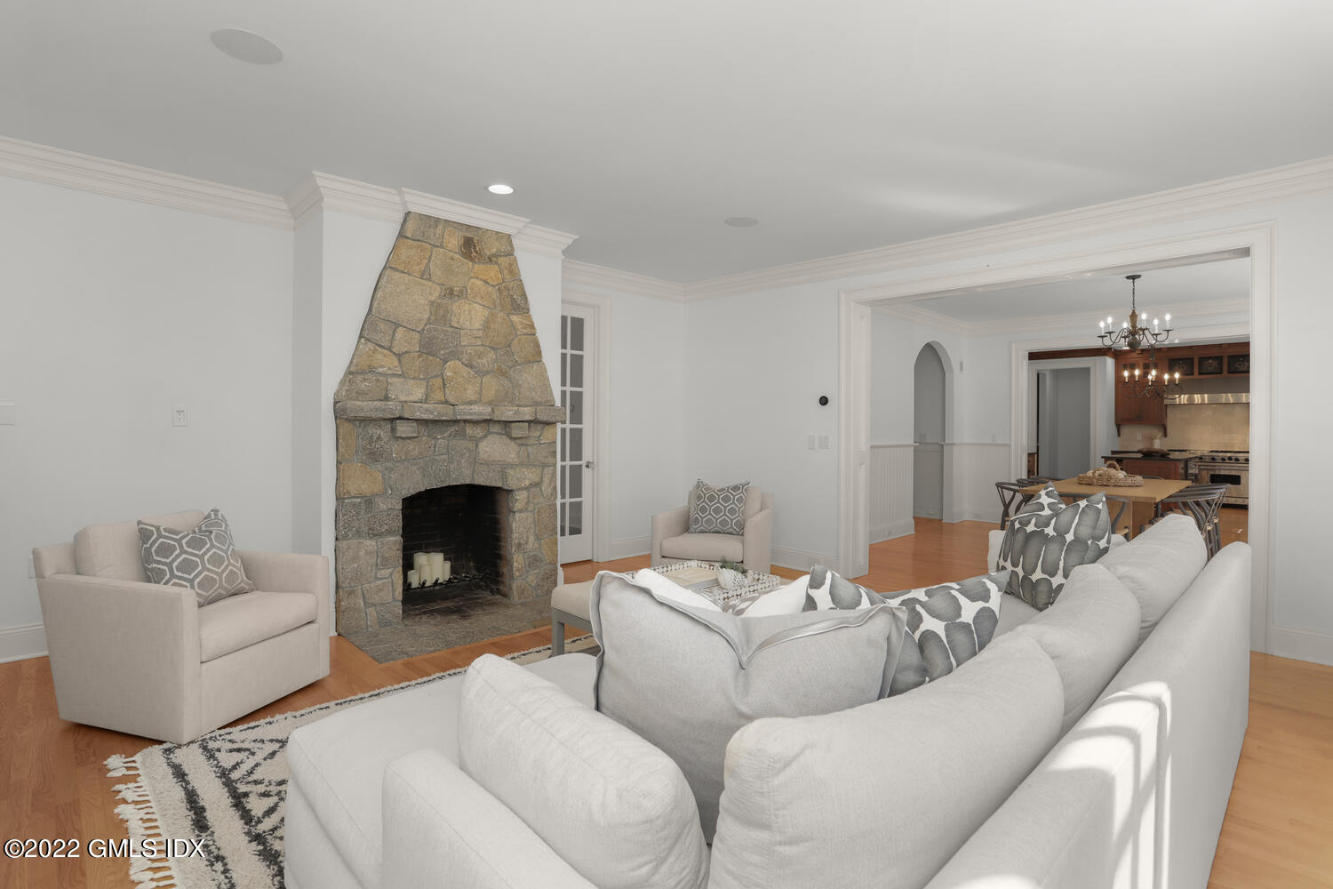 434 Cognewaugh Road Cos Cob, CT 06807 - Photo 9 of 47 a living room with furniture and a fireplace