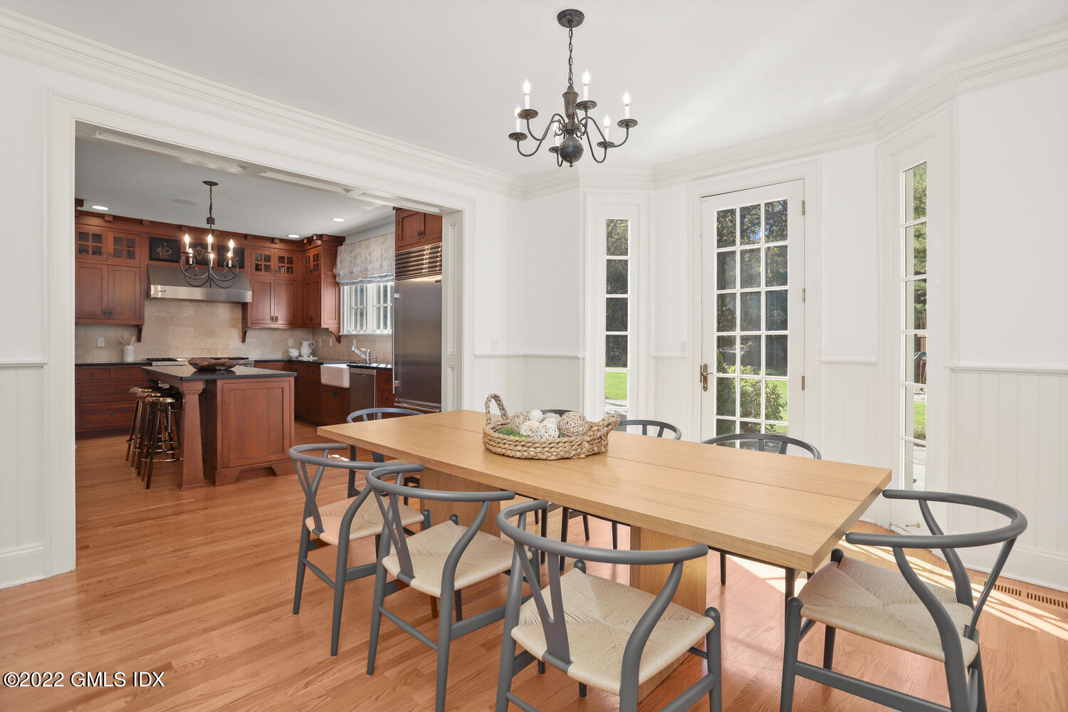 434 Cognewaugh Road Cos Cob, CT 06807 - Photo 10 of 47 a view of a dining room with furniture and wooden floor