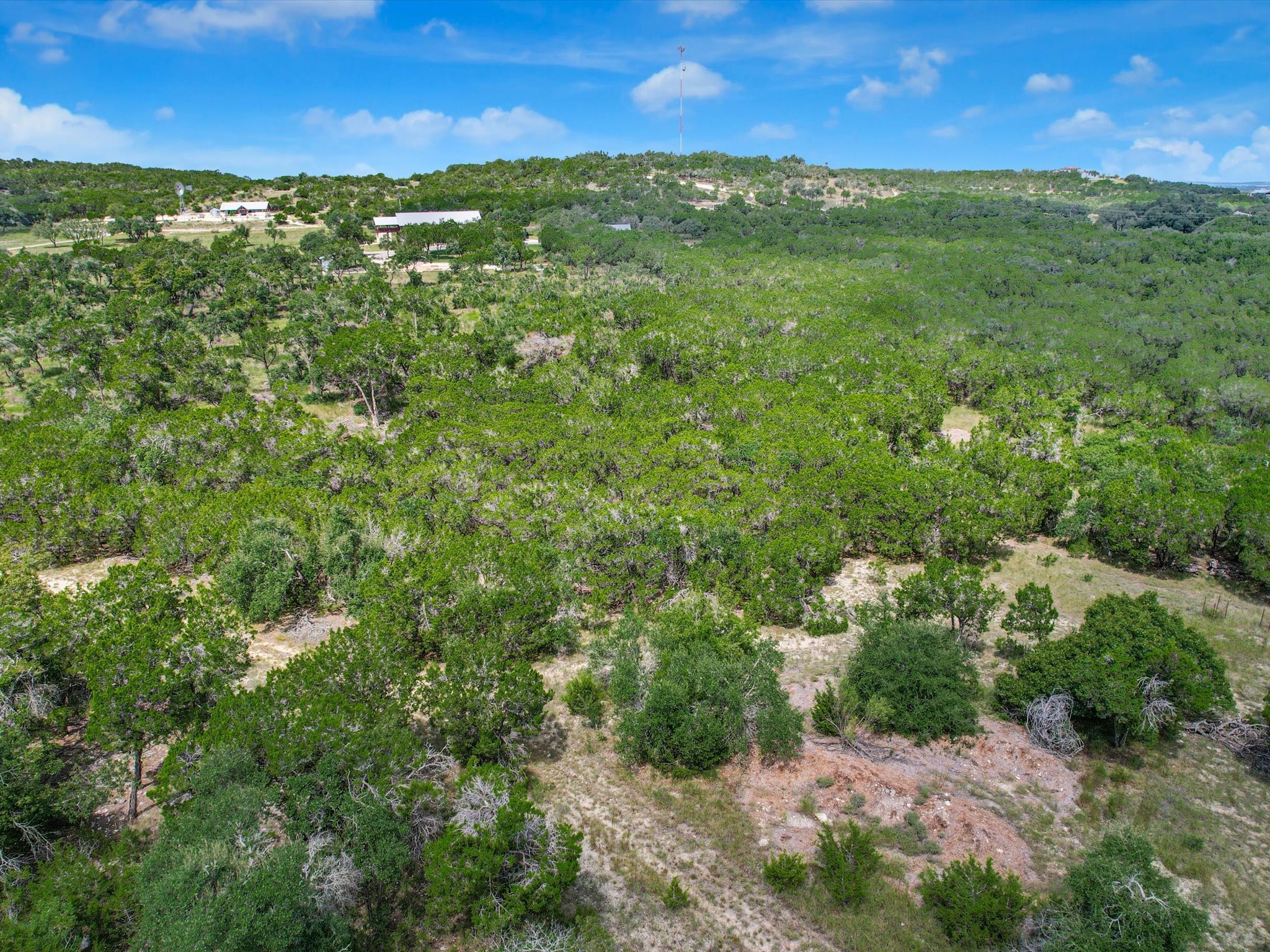 453 Lone Man Mountain Road Wimberley, TX 78676 - Photo 38 of 39 a view of a yard with an outdoor space