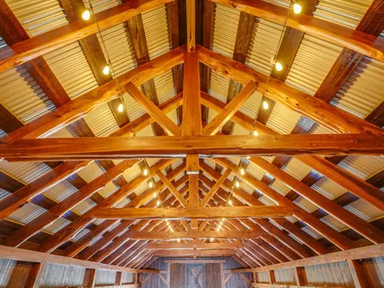 a view of a swimming pool with outdoor seating
