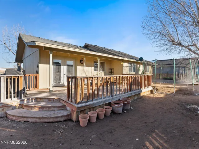 a view of a roof deck with a slide