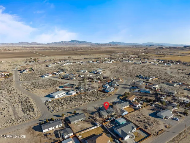 a view of an ocean and a mountain