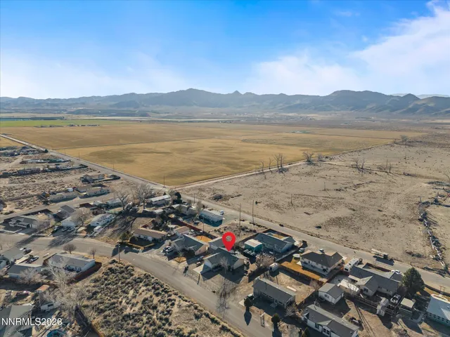 a view of an ocean and a mountain